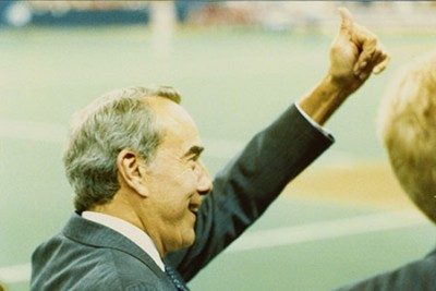 Photo: Dole waving to crowd at a World Series game, 1987