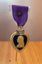 Purple Heart awarded to Dole in recognition of injuries sustained in wartime
