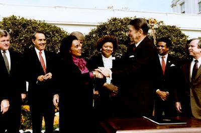Reagan Shaking Hands with Coretta Scott King after Signing Martin Luther King, Jr. Holiday Bill | Robert and Elizabeth Dole Archive and Special Collections